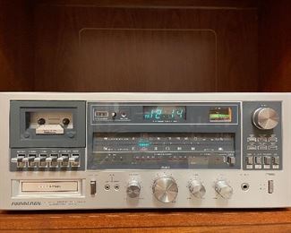 Vintage Soundesign AM/FM stereo receiver/cassette recorder/8 track player/turntable with dustcover. 