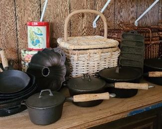 Cast iron pots, dutch oven, cornbread pan, skillets, and rare bundt cake pan.