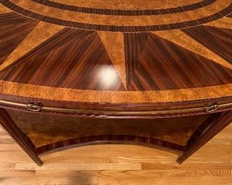 Beautiful banded and inlaid brass accented demilune console