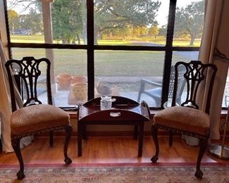 There are 4 matching antique chairs