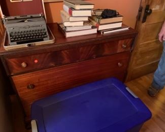 Typewriter, books, dresser