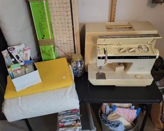 Singer sewing machine, fabric and accessories
