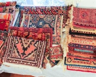 Dozens of all size Persian rugs
