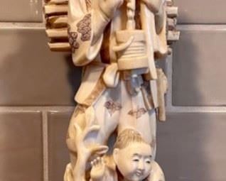 Antique Japanese Carved Ivory Okimono Of A Man With Wood On His Back And Child At His Feet