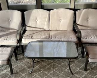 Set Of Aluminum Patio Furnisher Including (2) Rockers, Glass Top Table, (2) Ottomans, And Loveseat