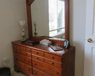 Cherry wood dresser and mirror.