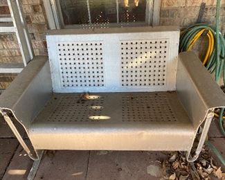 Vintage metal patio furniture includes glider, rocker and cantilever chair
