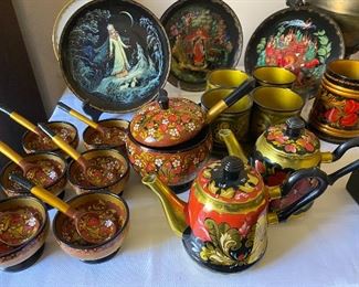 Lots of Russian folk art spoons, cups, plates…