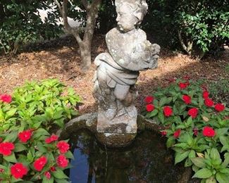Concrete fountain with angel.