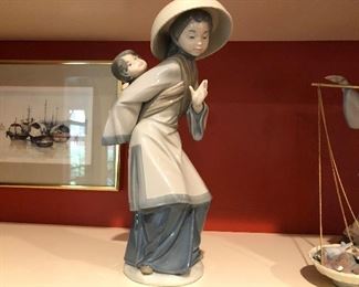 Retired 1998 Lladro Chinese Lady with Baby on Back Figurine.