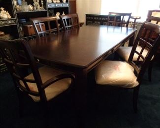 wooden dining table and 6 chairs