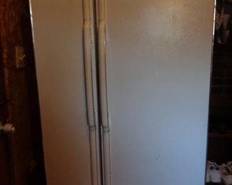 side by side Maytag refrigerator