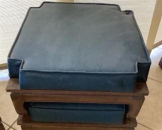 Low footstools or low stools for eating at a table.