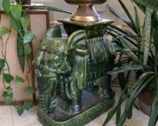 Heavy elephant figurines. Perfect to put a plant on top. 