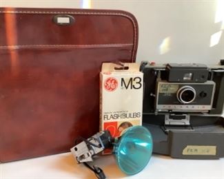 Polaroid camera with extras
