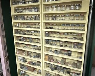 A rack of screws and such that are well organized