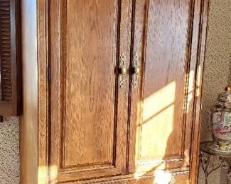 Drexel Heritage entertainment cabinet with slide in retracting doors