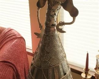 Melal woman sculpture