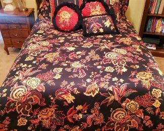 Full size comforter with 9 matching pillows and matching bedspreads. Comforter is reversible