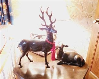Brass deer in various positions. Very large. The box is approximately 18 in tall while video is approximately 6 in tall