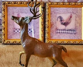 Approximately 2 ft tall bronze deer candle holder. We have two of these priced individually