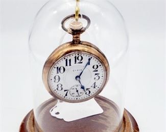 Elgin stopwatch with copper back and display case. Currently non-functioning