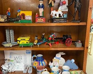 Collection of still banks; Easter items: Wii Sports accessories.