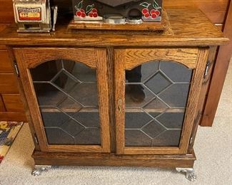 Vintage locking two-door cabinet with key.