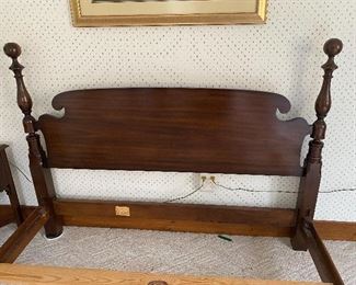 Kindel cherry queen-size bed.