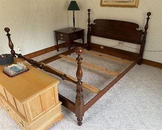 Kindel cherry queen-size bed.
