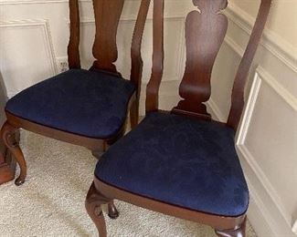 Two chairs for dining table that were not shown in additional photo.