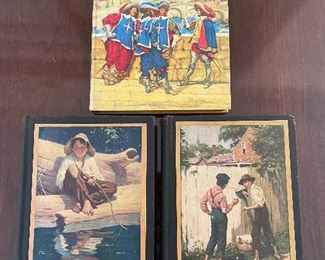 Vintage books, including Huckleberry Finn and Tom Sawyer.