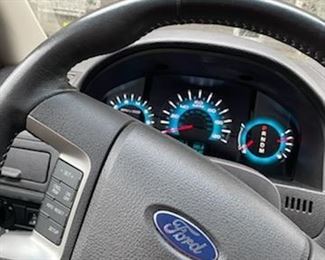 Steering wheel and dash of 2010 Ford Focus SL with Less than 43,000 Original Miles,