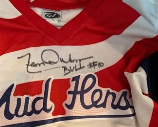 Mud Hens jersey signed by Leon “Bull” Durham . He was in the movie Little Big Leaguer.