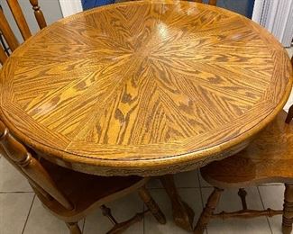 Solid oak table and five chairs 