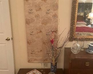 Antique silk Japanese panel over Danish Modern low stand 