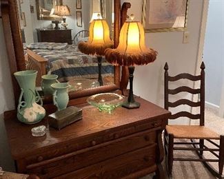 Empire oak low dresser w/ mirror w/ Weller and McCoy vases and Early ladder back Shaker style rocker