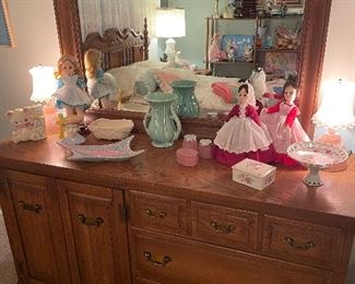 1960’s oak double dresser w/ vintage vanity lamps , McCoy pottery,Madame Alexander dolls, and vintage accessories 