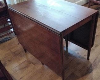 IT CONVERTS TO DROP LEAF