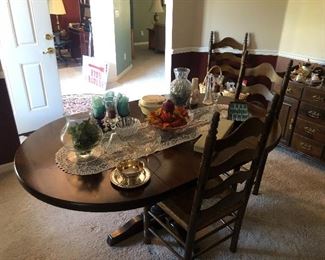Very cool dark colonial dining table with matching chairs ( would look great  painted a lighter color), has matching hutch