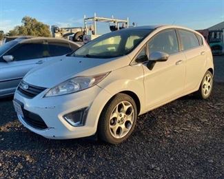 #144 • 2011 Ford Fiesta Year: 2011
Make: Ford
Model: Fiesta
Vehicle Type: Passenger Car
Mileage: 90878
Plate:
Body Type: 4 Door Hatchback
Trim Level: SES
Drive Line: FWD
Engine Type: L4, 1.6L
Fuel Type: Gasoline
Horsepower:
Transmission:
VIN #: 3FADP4FJ0BM157196