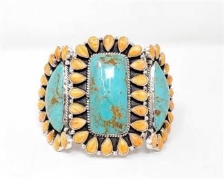 #596 • Native American G. James Large Statement Sterling Silver Cuff With Turquoise & Spiny Oyster, : Gorgeous Statement Cuff with Large Turquoise Stones and Spiny Oyster Borders set in Sterling silver!! Artist Marked One of a Kind !!!
Stamped "G.James" And "Sterling" Weighs Approx 161.7g Measures Approx 3.75"x2.75"
