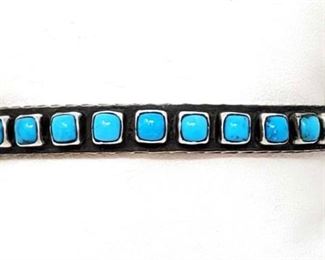 #616 • Navajo Natural Kingman Turquoise Row Bracelet: Sandcast Sterling Silver Bracelet Set With A Row Of 25 Natural Kingman Turquoise Stones.  Masterfully Handmade And Designed By Navajo Artist ERNEST RANGEL. Weighs Approx 33.0g Approx Cuff Size 2.25" Approx Width Of Cuff 0.8 cm