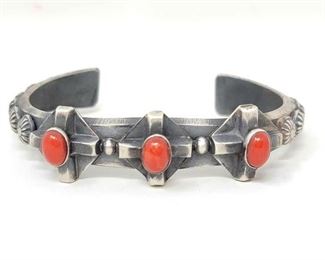 #620 • Native American Sterling Silver Coral Engraved Cuff: Sunning sterling silver cuff has 3 coral stone accents. Weighs Approx 40.2g Approx Cuff Size 2.5" Approx Width 1.5" Approx Stone Size 1.2 cm.