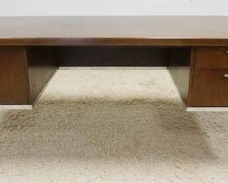 1006	DIRECTIONAL MIDCENTURY MODERN DESK W/ CHROME FRAME, HAS 3 DRAWERS, ONE IS A FILE DRAWER. 82 1/8 IN W, 36 1/8 IN DEPP, 28 3/4 IN H. HAS SCRATCHES ON THE TOP SURFACE

