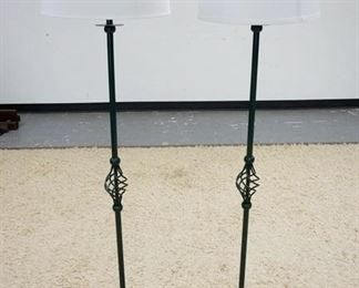 1037	PAIR OF IRON FLOOR LAMPS W/ AN OPEN TWIST DESIGN IN THE CENTER OF THE STEM. 58 IN H 
