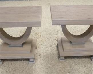 1066	PAIR OF ANDREW MARTIN END TABLES W/ STEP BASES & FEET 27 IN X 19 1/2 IN 24 IN H 
