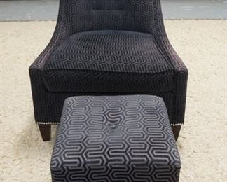 1067	UPHOLSTERED ARMCHAIR W/ OTTOMAN HAS SOME FADING ON THE UPHOLSTRY
