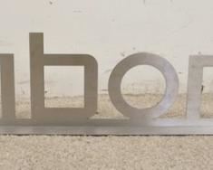 1103	ALUMINUM CLAIBORNE SIGN, 47 IN WIDE X 8 IN HIGH
