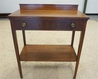 1146	MAHOGANY ONE DRAWER SERVER W/BRASS PULLS, HAS STRING INLAY, SCRATCH IN THE TOP SURFACE, 34 IN WIDE X 17 3/4 IN DEEP X 39 IN HIGH
